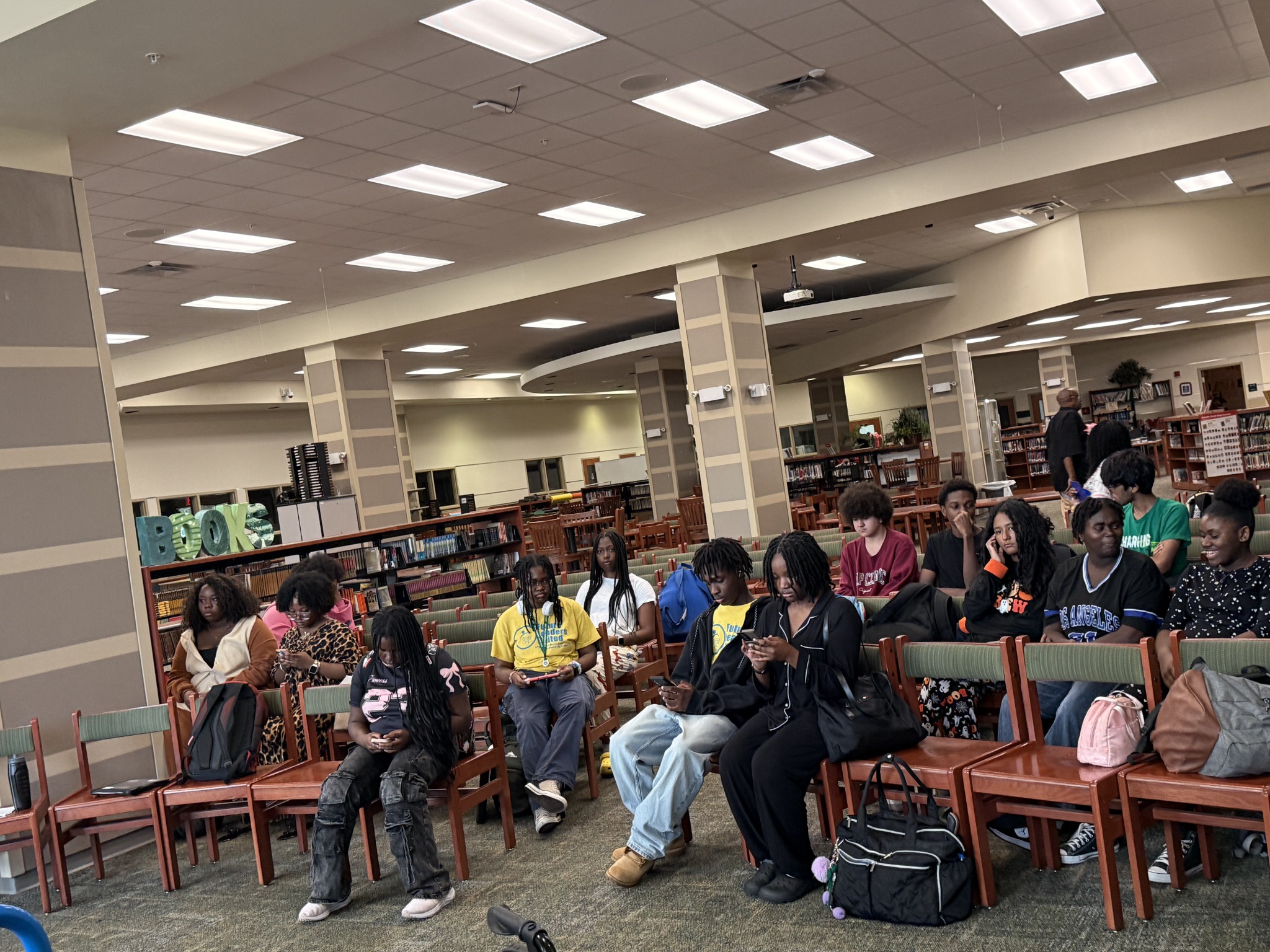 FLU students attending a library program session
